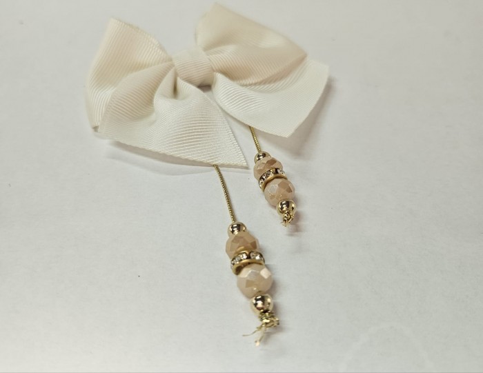 Laço de Gorgurão Creme com detalhe dourado.